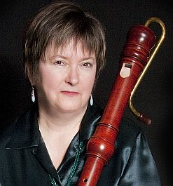 Photograph of Alison Melville with bass recorder