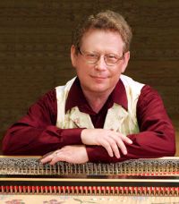 Photograph of Keith Womer at the harpsichord